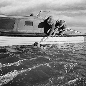 British soldiers in the water waiting to be rescued British soldiers in the water waiting to be rescued