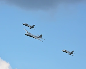 <b class=qtipBold><figcaption>CJ5 5484 Canberra and two Hunters</figcaption></b><br>Canberra and two Hunters, Goodwood Revival 2014, 2014, Autosport, Goodwood Revival, Goodwood Revival 2014, Goodwood Revival 2014 Friday, motor racing, motor sport, motorsport, nostalgia, racing cars, Revival Meeting, saloon cars, classic aircraft, jets, historic aircraft, Canberra, English Electric Canberra, XH 134, XL 573, XL 577, Hawker Hunter, Hunter,<br><em>© A© 2014 Chris McEvoy, all rights reserved, www.cjm-photography.co.uk.</em> CJ5 5484 Canberra and two Hunters