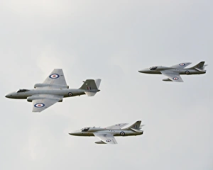 <b class=qtipBold><figcaption>CJ5 5486 Canberra and two Hunters</figcaption></b><br>Canberra and two Hunters, Goodwood Revival 2014, 2014, Autosport, Goodwood Revival, Goodwood Revival 2014, Goodwood Revival 2014 Friday, motor racing, motor sport, motorsport, nostalgia, racing cars, Revival Meeting, saloon cars, classic aircraft, jets, historic aircraft, Canberra, English Electric Canberra, XH 134, XL 573, XL 577, Hawker Hunter, Hunter,<br><em>© A© 2014 Chris McEvoy, all rights reserved, www.cjm-photography.co.uk.</em> CJ5 5486 Canberra and two Hunters