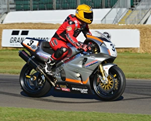 <b class=qtipBold><figcaption>CJ6 9091 Craig Mabbot, Honda RC45</figcaption></b><br>Craig Mabbot, Honda RC45, Goodwood Festival of Speed, 2017, Peaks of Performance, Motorsports Game Changers, automobiles, cars, entertainment, Festival of Speed, FoS, Goodwood, heritage, contemporary, modern, hill climb, July, June, motor sport, motorcars, nostalgia, racing, speed, sports, West Sussex., Moving Motor Show, motor bike racing, sports bikes, motor cycles, motorcycles, bikes, two wheels,<br><em>© 2017 Chris McEvoy, www.cjm-photography.co.uk, all rights reserved</em> CJ6 9091 Craig Mabbot, Honda RC45