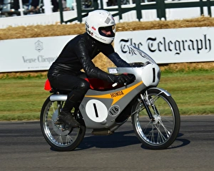 <b class=qtipBold><figcaption>CJ6 9096 Stuart Graham, Honda RC116</figcaption></b><br>Stuart Graham, Honda RC116, Goodwood Festival of Speed, 2017, Peaks of Performance, Motorsports Game Changers, automobiles, cars, entertainment, Festival of Speed, FoS, Goodwood, heritage, contemporary, modern, hill climb, July, June, motor sport, motorcars, nostalgia, racing, speed, sports, West Sussex., Moving Motor Show, motor bike racing, sports bikes, motor cycles, motorcycles, bikes, two wheels,<br><em>© 2017 Chris McEvoy, www.cjm-photography.co.uk, all rights reserved</em> CJ6 9096 Stuart Graham, Honda RC116