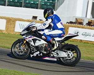 <b class=qtipBold><figcaption>CJ6 9305 Bruce Wilson, BMW HP4 Racer</figcaption></b><br>Bruce Wilson, BMW HP4 Racer, Goodwood Festival of Speed, 2017, Peaks of Performance, Motorsports Game Changers, automobiles, cars, entertainment, Festival of Speed, FoS, Goodwood, heritage, contemporary, modern, hill climb, July, June, motor sport, motorcars, nostalgia, racing, speed, sports, West Sussex., Moving Motor Show, motor bike racing, sports bikes, motor cycles, motorcycles, bikes, two wheels,<br><em>© 2017 Chris McEvoy, www.cjm-photography.co.uk, all rights reserved</em> CJ6 9305 Bruce Wilson, BMW HP4 Racer