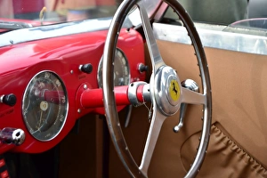 <b class=qtipBold><figcaption>CM1 2100 Ferrari steering wheel</figcaption></b><br>Ferrari steering wheel, from a time when racing cars were much simpler, Goodwood 72nd Members Meeting, 72nd members Meeting, Ferrari, Ferrari steering wheel, Goodwood, Goodwood 72nd Members Meeting, GRRC, Historic Racing, motor sport, motorsport, nostalgia, prancing horse.<br><em>© (C)2014 Chris McEvoy, all rights reserved, www.cjm-photography.co.uk.</em> CM1 2100 Ferrari steering wheel