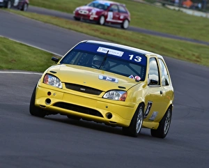 <b class=qtipBold><figcaption>CM12 7482 Guy Parr, Ford Fiesta 1600</figcaption></b><br>Guy Parr, Ford Fiesta 1600, Castle Combe, Castle Combe Saloon Championship, 50th Anniversary, HSCC, Historic Sports Car Club, Castle Combe, Chris McEvoy, circuit racing, CJM Photography, classic cars, classic event, Classic Racing Cars, England, historic cars, Historic motorracing, historic motorsport, historic racing cars, Historic Sports Car Club, Historic Touring Cars, HRSR, HSCC, motor racing, motor sport, motorracing, motorsport, nostalgia, old racing cars, racing, racing cars, retro, saloon cars, speed, sports cars, sports saloons, vintage, Wiltshire<br><em>© ©2016 Chris McEvoy, all rights reserved, www.cjm-photography.co.uk</em> CM12 7482 Guy Parr, Ford Fiesta 1600