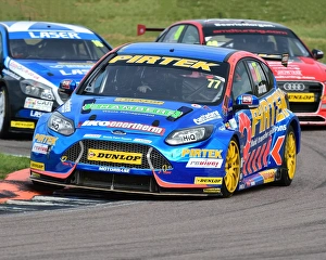 <b class=qtipBold><figcaption>CM15 9636 Andrew Jordan, Ford Focus</figcaption></b><br>Andrew Jordan, Ford Focus, BTCC Rockingham, Rockingham Motorsport Speedway, Sunday, 28th August, 2016, Autosport, British Touring Car Championship, BTCC, BTCC Rockingham, BTCC, cars, England, motor sport, Northamptonshire, racing circuit racing, Rockingham, Rockingham Raceway, , Touring Car Championship, touring cars, UK, saloon cars, tin tops,<br><em>© 2016 Chris McEvoy, all rights reserved, www.cjm-photography.co.uk.</em> CM15 9636 Andrew Jordan, Ford Focus