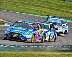 <b class=qtipBold><figcaption>CM15 9702 Andrew Jordan, Ford Focus</figcaption></b><br>Andrew Jordan, Ford Focus, BTCC Rockingham, Rockingham Motorsport Speedway, Sunday, 28th August, 2016, Autosport, British Touring Car Championship, BTCC, BTCC Rockingham, BTCC, cars, England, motor sport, Northamptonshire, racing circuit racing, Rockingham, Rockingham Raceway, , Touring Car Championship, touring cars, UK, saloon cars, tin tops,<br><em>© 2016 Chris McEvoy, all rights reserved, www.cjm-photography.co.uk.</em> CM15 9702 Andrew Jordan, Ford Focus