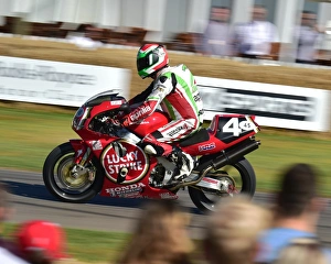 <b class=qtipBold><figcaption>CM20 0030 Mick Loughlin, Honda RC45</figcaption></b><br>Mick Loughlin, Honda RC45, Goodwood Festival of Speed, 2017, Peaks of Performance, Motorsports Game Changers, automobiles, cars, entertainment, Festival of Speed, FoS, Goodwood, heritage, contemporary, modern, hill climb, motor bike racing, sports bikes, motor cycles, motorcycles, bikes, two wheels, July, June, motor sport, motorcars, nostalgia, racing, speed, sports, West Sussex., Moving Motor Show,<br><em>© 2017 Chris McEvoy, www.cjm-photography.co.uk, all rights reserved</em> CM20 0030 Mick Loughlin, Honda RC45
