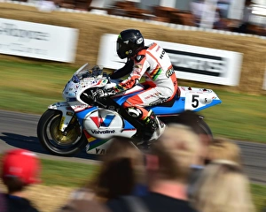 <b class=qtipBold><figcaption>CM20 0084 Bruce Anstey, Honda RC213V</figcaption></b><br>Bruce Anstey, Honda RC213V, Goodwood Festival of Speed, 2017, Peaks of Performance, Motorsports Game Changers, automobiles, cars, entertainment, Festival of Speed, FoS, Goodwood, heritage, contemporary, modern, hill climb, motor bike racing, sports bikes, motor cycles, motorcycles, bikes, two wheels, July, June, motor sport, motorcars, nostalgia, racing, speed, sports, West Sussex., Moving Motor Show,<br><em>© 2017 Chris McEvoy, www.cjm-photography.co.uk, all rights reserved</em> CM20 0084 Bruce Anstey, Honda RC213V