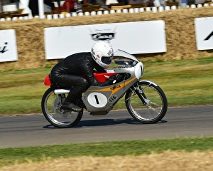 <b class=qtipBold><figcaption>CM20 0232 Stuart Graham, Honda RC116</figcaption></b><br>Stuart Graham, Honda RC116, Goodwood Festival of Speed, 2017, Peaks of Performance, Motorsports Game Changers, automobiles, cars, entertainment, Festival of Speed, FoS, Goodwood, heritage, contemporary, modern, hill climb, motor bike racing, sports bikes, motor cycles, motorcycles, bikes, two wheels, July, June, motor sport, motorcars, nostalgia, racing, speed, sports, West Sussex., Moving Motor Show,<br><em>© 2017 Chris McEvoy, www.cjm-photography.co.uk, all rights reserved</em> CM20 0232 Stuart Graham, Honda RC116