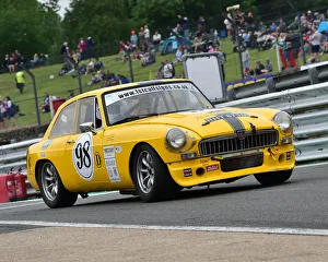 <b class=qtipBold><figcaption>CM23 9386 Jonnie Wheeler, MGB GT V8</figcaption></b><br>Jonnie Wheeler, MGB GT V8, Bernie's V8s, US Muscle Cars, American Speedfest VI, Brands Hatch, June 2018, automobiles, Autosport, cars, circuit racing, England, entertainment, European, June 2018, Kent, motor racing, motor sport, motorracing, racing, track racing, nostalgia, classic cars, historic cars, sports cars,<br><em>© 2018 Chris McEvoy, www.cjm-photography.co.uk, all rights reserved</em> CM23 9386 Jonnie Wheeler, MGB GT V8