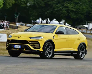 <b class=qtipBold><figcaption>CM24 6263 Lamborghini Urus</figcaption></b><br>Lamborghini Urus, Michelin Supercar Run, First Glance, Festival of Speed - The Silver Jubilee, Goodwood Festival of Speed, 2018, Motorsports, automobiles, cars, entertainment, Festival of Speed, FoS, Goodwood, heritage, contemporary, modern, hill climb, July, motor sport, motorcars, nostalgia, racing, speed, sports, West Sussex., England, supercars, modern cars, contemprary cars, hypercars,<br><em>© 2018 Chris McEvoy, www.cjm-photography.co.uk, all rights reserved</em> CM24 6263 Lamborghini Urus