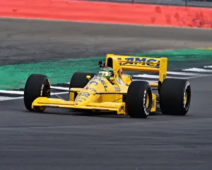 <b class=qtipBold><figcaption>CM24 9207 Steve Griffiths, Lotus 101</figcaption></b><br>Steve Griffiths, Lotus 101, Legends of Modern Formula One, F1, Formula 1, Silverstone Classic, July 2018, Silverstone, Chris McEvoy, circuit racing, cjm-photography, Classic Racing Cars, competition, historic racing cars, Historic Sports Car Club, HSCC, motor racing, motorsport, Northamptonshire, nostalgia, retro, rocking and racing, single seaters, speed, vehicles, racing cars, open wheelers, monoposto,<br><em>© 2018 Chris McEvoy, www.cjm-photography.co.uk, all rights reserved</em> CM24 9207 Steve Griffiths, Lotus 101