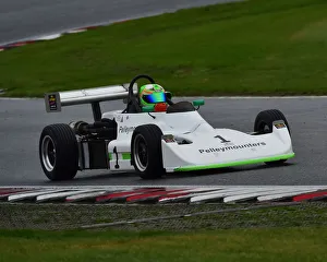 <b class=qtipBold><figcaption>CM25 9084 Andrew Park, Reynard SF81</figcaption></b><br>Andrew Park, Reynard SF81, Historic Formula Ford 2000, HSCC, Historic Race Meeting, Brands Hatch, September 2018, cars, Classic Racing Cars, Historic Racing, Historic Sports Car Club, autosport, motor racing, motor sport, nostalgia, racing cars, outdoors, racing, circuit racing, racing, speed, Indy circuit, single seaters, monoposto, rooster tail, wet race, rain, spray,<br><em>© 2018 Chris McEvoy, www.cjm-photography.co.uk, all rights reserved</em> CM25 9084 Andrew Park, Reynard SF81