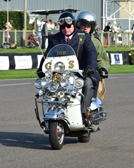 <b class=qtipBold><figcaption>CM4 9023 Mod's on scooters</figcaption></b><br>Goodwood Revival 2014<br><em>© A© 2014 Chris McEvoy, all rights reserved, www.cjm-photography.co.uk.</em> CM4 9023 Mod's on scooters