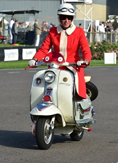 <b class=qtipBold><figcaption>CM4 9034 Mod's on scooters</figcaption></b><br>Goodwood Revival 2014<br><em>© A© 2014 Chris McEvoy, all rights reserved, www.cjm-photography.co.uk.</em> CM4 9034 Mod's on scooters
