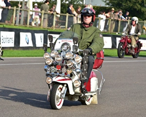<b class=qtipBold><figcaption>CM4 9067 Mod's on scooters</figcaption></b><br>Mod's on scooters, Goodwood Revival 2014, Goodwood Revival 2014, Goodwood, Revival, scooters, MODs, Lambretta, nostalgia, Goodwood Transport Corps,<br><em>© A© 2014 Chris McEvoy, all rights reserved, www.cjm-photography.co.uk.</em> CM4 9067 Mod's on scooters