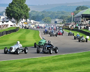 <b class=qtipBold><figcaption>CM4 9078 Mass start</figcaption></b><br>Mass start, Goodwood Trophy, Goodwood Revival 2014, 2014, Autosport, Goodwood Revival, Goodwood Revival 2014, Goodwood Revival 2014 Friday, Goodwood Revival 2014 Saturday, motor racing, motor sport, motorsport, nostalgia, racing cars, Revival Meeting, Goodwood Trophy, GP, Formula One, Formula Two, Formule Libre,<br><em>© A© 2014 Chris McEvoy, all rights reserved, www.cjm-photography.co.uk.</em> CM4 9078 Mass start