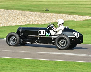 <b class=qtipBold><figcaption>CM4 9082 John Ure, ERA B-type R1B</figcaption></b><br>John Ure, ERA B-type R1B, Goodwood Trophy, Goodwood Revival 2014, 2014, Autosport, Goodwood Revival, Goodwood Revival 2014, Goodwood Revival 2014 Friday, Goodwood Revival 2014 Saturday, motor racing, motor sport, motorsport, nostalgia, racing cars, Revival Meeting, Goodwood Trophy, GP, Formula One, Formula Two, Formule Libre,<br><em>© A© 2014 Chris McEvoy, all rights reserved, www.cjm-photography.co.uk.</em> CM4 9082 John Ure, ERA B-type R1B