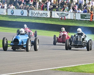 <b class=qtipBold><figcaption>CM4 9111 ERA's in battle</figcaption></b><br>ERA's in battle, Goodwood Trophy, Goodwood Revival 2014, 2014, Autosport, Goodwood Revival, Goodwood Revival 2014, Goodwood Revival 2014 Friday, Goodwood Revival 2014 Saturday, motor racing, motor sport, motorsport, nostalgia, racing cars, Revival Meeting, Goodwood Trophy, GP, Formula One, Formula Two, Formule Libre,<br><em>© A© 2014 Chris McEvoy, all rights reserved, www.cjm-photography.co.uk.</em> CM4 9111 ERA's in battle