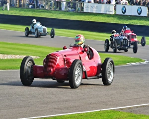 <b class=qtipBold><figcaption>CM4 9113 Andrew Wolfe, Maserati V8RI</figcaption></b><br>Andrew Wolfe, Maserati V8RI, Goodwood Trophy, Goodwood Revival 2014, 2014, Autosport, Goodwood Revival, Goodwood Revival 2014, Goodwood Revival 2014 Friday, Goodwood Revival 2014 Saturday, motor racing, motor sport, motorsport, nostalgia, racing cars, Revival Meeting, Goodwood Trophy, GP, Formula One, Formula Two, Formule Libre,<br><em>© A© 2014 Chris McEvoy, all rights reserved, www.cjm-photography.co.uk.</em> CM4 9113 Andrew Wolfe, Maserati V8RI