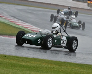 <b class=qtipBold><figcaption>CM9 5653 Jonathan Fyda, U2 Mk3</figcaption></b><br>Jonathan Fyda, U2 Mk3, Peter Arundell Trophy, Historic Formula Junior, Silverstone Classic 2015, 2015, Buckinghamshire, Championship race, classic cars, classic event, Classic Racing Cars, England, Finals, FJHRA, Formula Junior Historic Racing Association, Historic motorracing, historic motorsport, historic racing cars, Historic Sports Car Club, HSCC, motor racing, motor sport, motorracing, motorsport, Northamptonshire, nostalgia, old racing cars, Peter Arundell Trophy, Peter Arundell Trophy for Historic Formula Junior, racing, racing cars, rain, retro, Silverstone, Silverstone Classic, Silverstone Classic 2015, Silverstone International, spray, vintage, wet race<br><em>© ©2015 Chris McEvoy, all rights reserved, www.cjm-photography.co.uk</em> CM9 5653 Jonathan Fyda, U2 Mk3