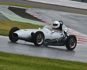 <b class=qtipBold><figcaption>CM9 5664 Roger Dexter, Elva-DKW 100</figcaption></b><br>Roger Dexter, Elva-DKW 100, Peter Arundell Trophy, Historic Formula Junior, Silverstone Classic 2015, 2015, Buckinghamshire, Championship race, classic cars, classic event, Classic Racing Cars, England, Finals, FJHRA, Formula Junior Historic Racing Association, Historic motorracing, historic motorsport, historic racing cars, Historic Sports Car Club, HSCC, motor racing, motor sport, motorracing, motorsport, Northamptonshire, nostalgia, old racing cars, Peter Arundell Trophy, Peter Arundell Trophy for Historic Formula Junior, racing, racing cars, rain, retro, Silverstone, Silverstone Classic, Silverstone Classic 2015, Silverstone International, spray, vintage, wet race<br><em>© ©2015 Chris McEvoy, all rights reserved, www.cjm-photography.co.uk</em> CM9 5664 Roger Dexter, Elva-DKW 100