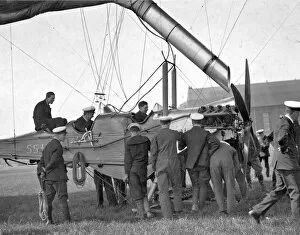Early British dirigible on the ground with crew