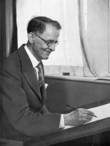 <b class=qtipBold><figcaption>William Heath Robinson</figcaption></b><br>William Heath Robinson (1872 - 1944), British cartoonist and illustrator, best known for his contraptions which earned him the nickname of the 'Gadget King'. Pictured with pencil in hand at his drawing board. Date: 1947<br><em>© Copyright Mary Evans Picture Library 2008</em> William Heath Robinson