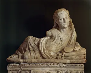Alabaster urn featuring Haruspex priest holding up sheeps liver from Volterra Alabaster urn featuring Haruspex priest holding up sheeps liver from Volterra