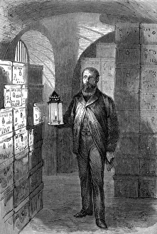 Bank note store in the vaults of the Bank of England c1870. Man is holding candle lantern Bank note store in the vaults of the Bank of England c1870. Man is holding candle lantern