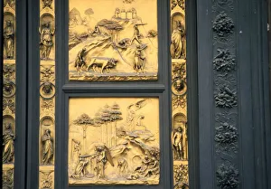 Baptistry building, Florence, Italy, showing two panels of the famous doors by Lorenzo Baptistry building, Florence, Italy, showing two panels of the famous doors by Lorenzo