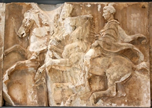 Bas-relief with men on galloping horses Bas-relief with men on galloping horses