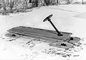 <b class=qtipBold><figcaption>To The Bat Sled, Robin</figcaption></b><br>United States: c. 1950 A fancy snow sled, complete with steering wheel and Batman insignias.<br><em>© Underwood Archives/UIG</em> To The Bat Sled, Robin