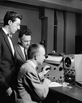 <b class=qtipBold><figcaption>Bell Lab Scientists At Work</figcaption></b><br>United States: December, 1957. E.I. Doucette, H.A. Stone, and R.M. Warner, Jr. testing their new field-effect varistor that they invented at Bell Telephone Laboratories.<br><em>© Underwood Archives/UIG</em> Bell Lab Scientists At Work