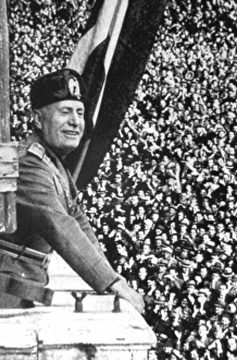 Benito Mussolini speaking at balcony, 1911
