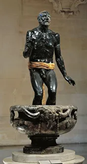 Black marble and alabaster statue of Old Fisherman, Roman copy of Hellenistic original Black marble and alabaster statue of Old Fisherman, Roman copy of Hellenistic original