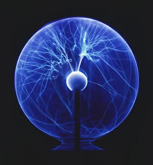 Blue glass globe filled with bright plasma lines Blue glass globe filled with bright plasma lines
