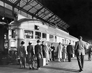 <b class=qtipBold><figcaption>Boarding The California Zephyr</figcaption></b><br>Oakland, California: c. 1950 Passengers preparing to board the California Zephyr train which connected from San Francisco to Chicago. It was operated jointly by the Chicago, Burlington and Quincy Railroad (CB&Q), Denver and Rio Grande Western Railroad (D&RGW) and Western Pacific Railroad (WP).<br><em>© Underwood Archives/UIG</em> Boarding The California Zephyr
