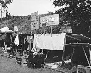 <b class=qtipBold><figcaption>Bonus Expeditionary Force Camp</figcaption></b><br>Washington, D.C.: 1932. An encampment of shanties built by Brooklyn veterans in the Bonus Expeditionary Forces in Washington, D.C<br><em>© Underwood Archives/UIG</em> Bonus Expeditionary Force Camp