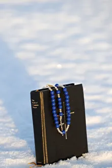 Book of common prayer and rosary on snow. Norway Book of common prayer and rosary on snow. Norway