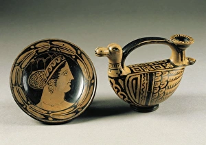 Bowl depicting a womans head and vase in the shape of a duck Bowl depicting a womans head and vase in the shape of a duck