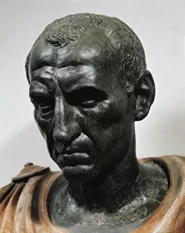 Bronze head with marble bust of Julius Caesar