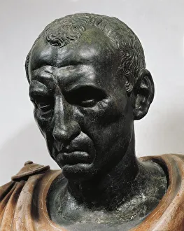 Bronze head with marble bust of Julius Caesar Bronze head with marble bust of Julius Caesar