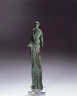 Bronze statue depicting female figure making offering Bronze statue depicting female figure making offering