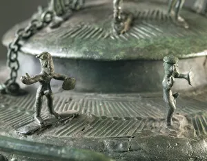 Bronze vase with lid ornament depicting ritual dance around chained bear, from Campi Bisenzio, province of Florence, Detail, dancers Bronze vase with lid ornament depicting ritual dance around chained bear, from Campi Bisenzio, province of Florence, Detail, dancers
