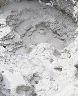 Bubbling mud in a hot spring, view from above Bubbling mud in a hot spring, view from above