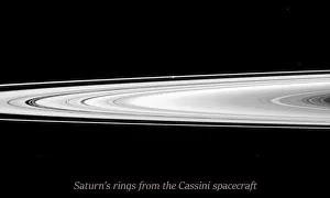 The Cassini spacecraft looks across Saturns rings and finds the moon Prometheus The Cassini spacecraft looks across Saturns rings and finds the moon Prometheus