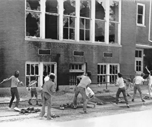 <b class=qtipBold><figcaption>Children Breaking Windows</figcaption></b><br>East Alton, Illinois: August 13, 1971 Ten school children caught in the act of breaking winodws at their school, except this time it was OK. The school is to be torn down and they had permission to do so.<br><em>© Underwood Archives/UIG</em> Children Breaking Windows