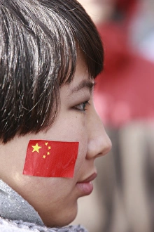 Chinese woman watching the Olympic Torch Relay in Paris Chinese woman watching the Olympic Torch Relay in Paris