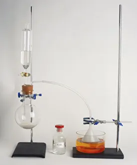 Clamp stands holding apparatus to prepare hydrochloric acid using sulphuric acid Clamp stands holding apparatus to prepare hydrochloric acid using sulphuric acid